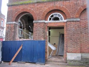 The brick infills to the arches have now been removed